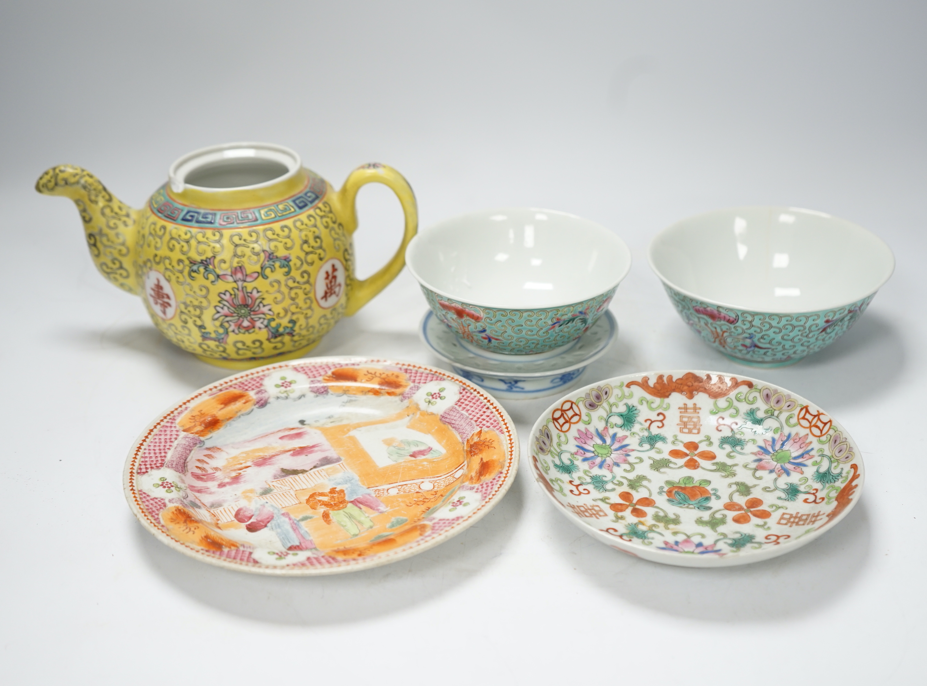 Six Chinese ceramic items; a teapot, two bowls and three small dishes, teapot 10cm